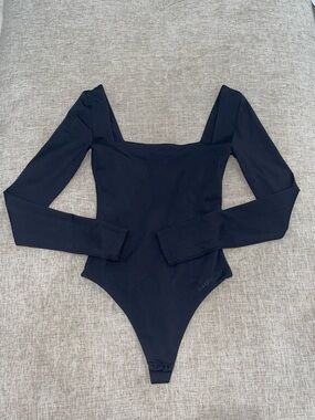 ARITZIA Black Long Sleeve One-Piece Bodysuit